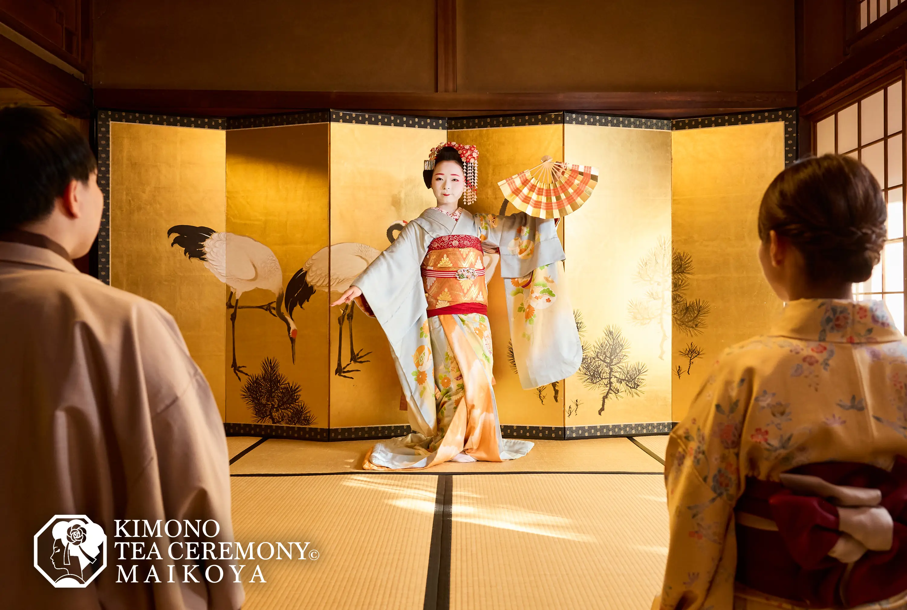 Guests watching a maiko traditional dance performance in Kyoto
